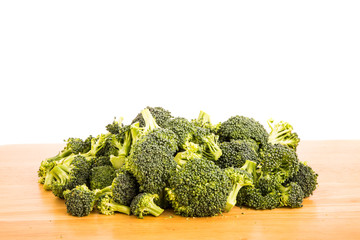 Fresh Broccoli on Wood Table