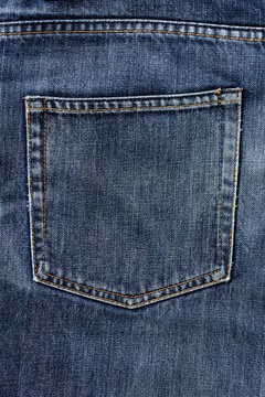 aged blue jeans pocket