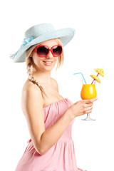 Woman with sunglasses holding an exotic cocktail