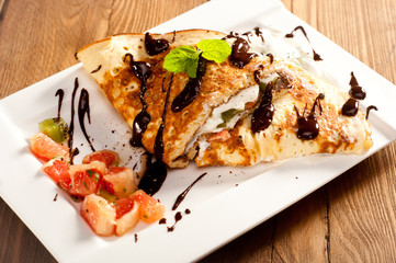 Sponge Pancakes with cheese, fruit, chocolate and mint
