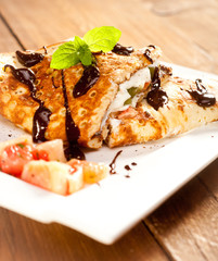 Sponge Pancakes with cheese, fruit, chocolate and mint