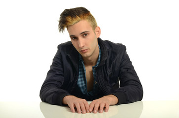 Obraz premium Beautiful brunette man wearing a black jacket with hair on fire