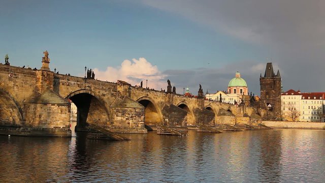 View from Kampa of Charles Bridge in Prague at sunset