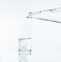 Pouring water on glass