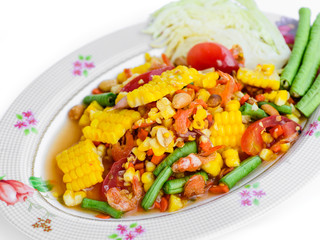 fresh vegetable salad with corn,tomato, peanut and dried shrimp.