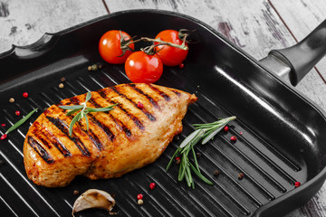 grilled chicken fillet in the pan