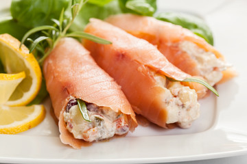 Smoked salmon roll with vegetable salad