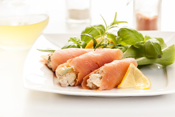 Smoked salmon roll with vegetable salad