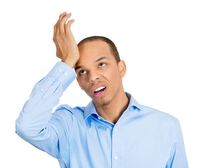 Fototapeta premium Duh moment. Portrait, headshot of young man realizing mistake
