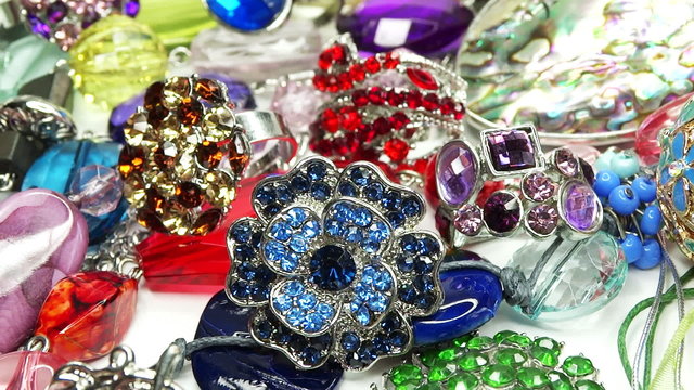 bright crystals beads and rings  fashion background