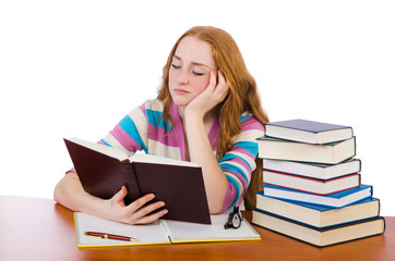 Young student with books isolated on white