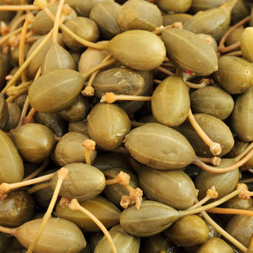 caper berries as background