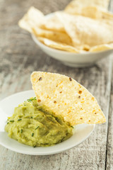 Home made nachos with guacamole