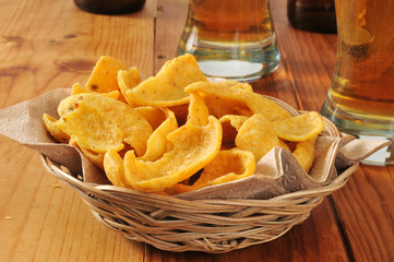 Basket of corn chips and beer