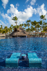 Tropical resort swimming pool in Punta Cana, Dominican Republic