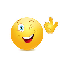 Winking emoticon showing ok sign