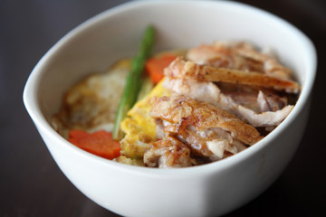 Grilled Chicken teriyaki rice on wood background