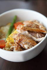 Grilled Chicken teriyaki rice on wood background
