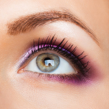 Beautiful womanish eye with glamorous makeup