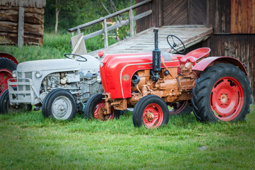 Vintage tractor by barn