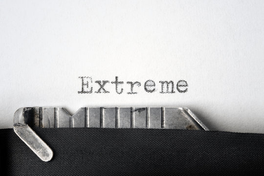 "Extreme" written on an old typewriter. Closeup.