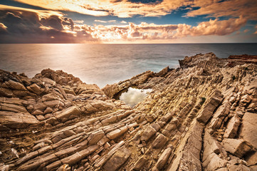 Fototapeta na wymiar The Sicilian coast at sunset