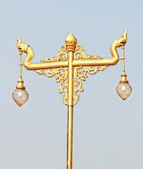 Fototapeta na wymiar Golden Vintage Lamp Post, Isolated on Background