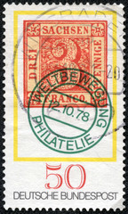 stamp shows an old 3pf. stamp of Saxony from 1850
