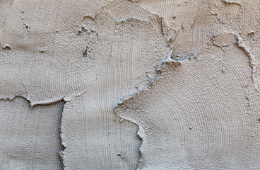 plasterer concrete on wall of house construction