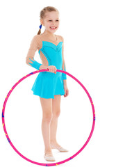 Beautiful little gymnast with the hoop