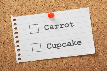 Carrot or Cupcake tick boxes on a cork notice board