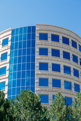 Fototapeta premium Round Stone Building with Blue Windows