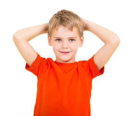 boy with his hands behind his head