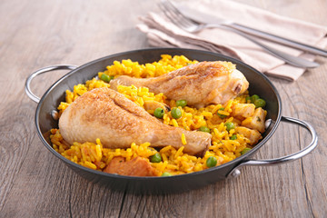 paella with chicken leg and seafood