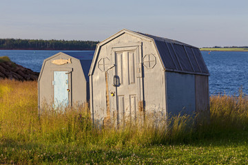 Ice Fishing Shacks on shore for the summer