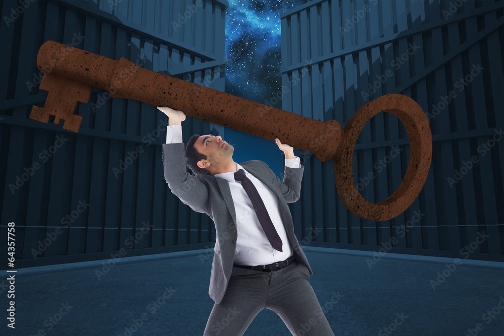 Aufkleber composite image of unsmiling businessman carrying large key