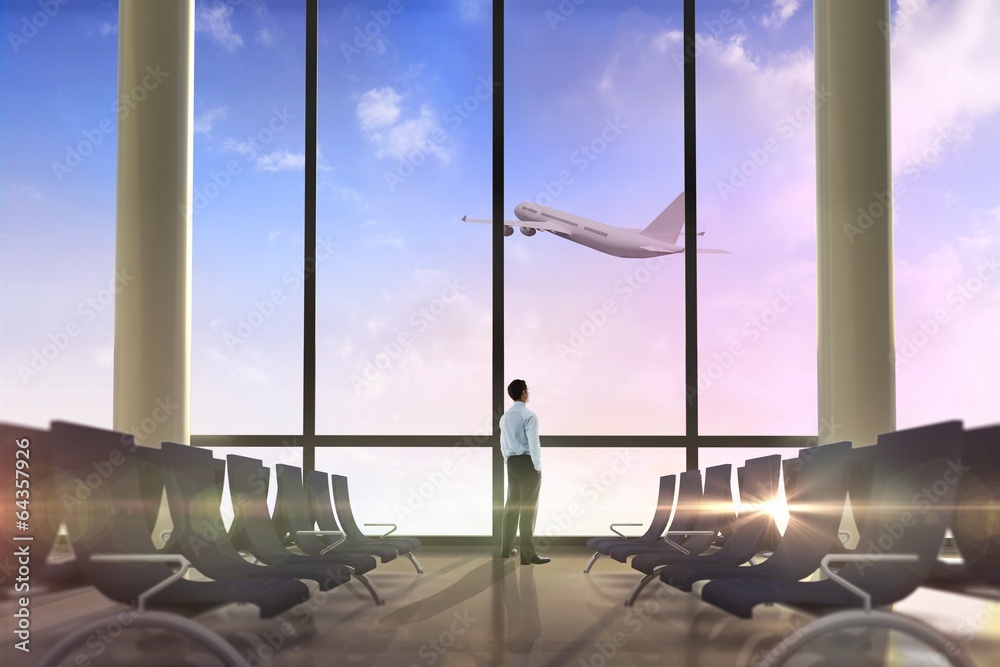 Poster composite image of businessman standing with hands in pockets