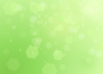 Green spring natural background with bokeh and ray of lights