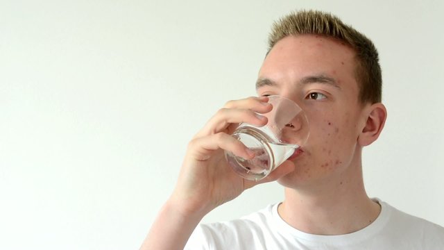 man drinks water - isolated