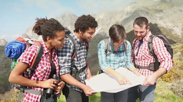 Group of Hikers Looking at Map