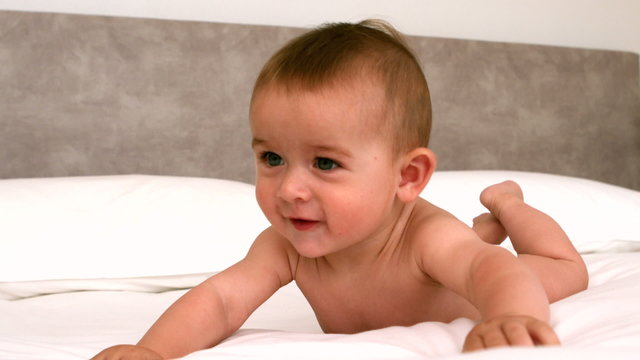 Cute baby on a bed