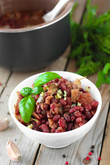 Cooked spicy red beans with tomato sauce and vegetables