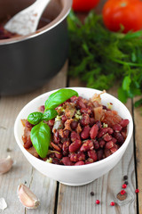 Cooked spicy red beans with tomato sauce and vegetables