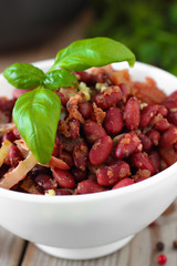 Cooked spicy red beans with tomato sauce and vegetables