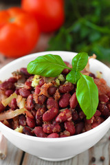 Cooked spicy red beans with tomato sauce and vegetables