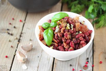 Cooked spicy red beans with tomato sauce and vegetables
