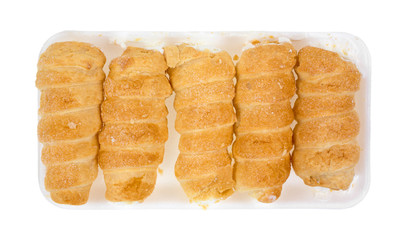 Cream horns on a retail foam tray