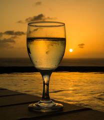 Glass of wine in the sunset