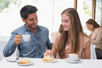 Couple having coffee at coffee shop