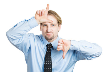 You suck. Business man giving looser, thumbs down gesture, sign